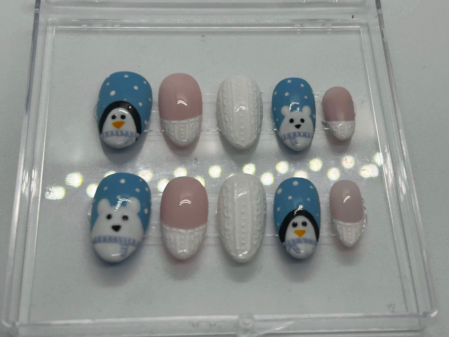 Polar bear and penguin knit gel nails