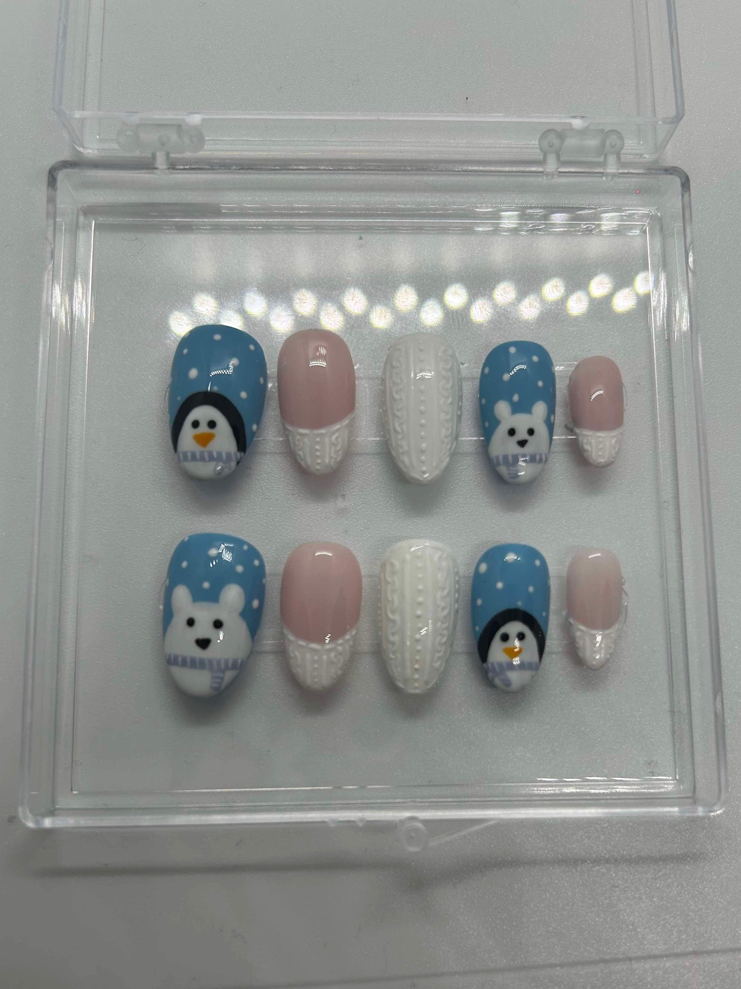 Polar bear and penguin knit gel nails