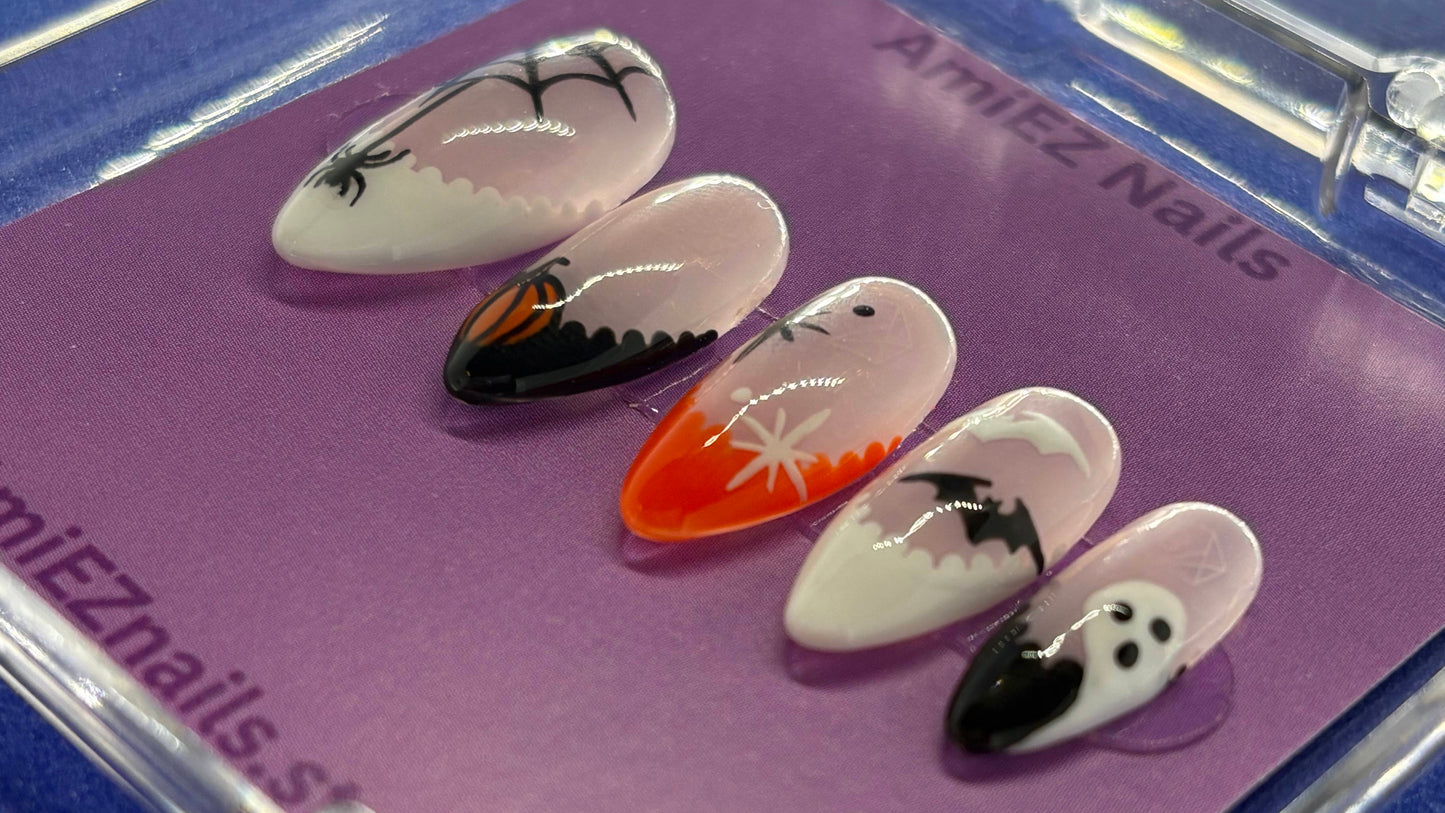 Set of decorative nails in clear packaging with a purple label