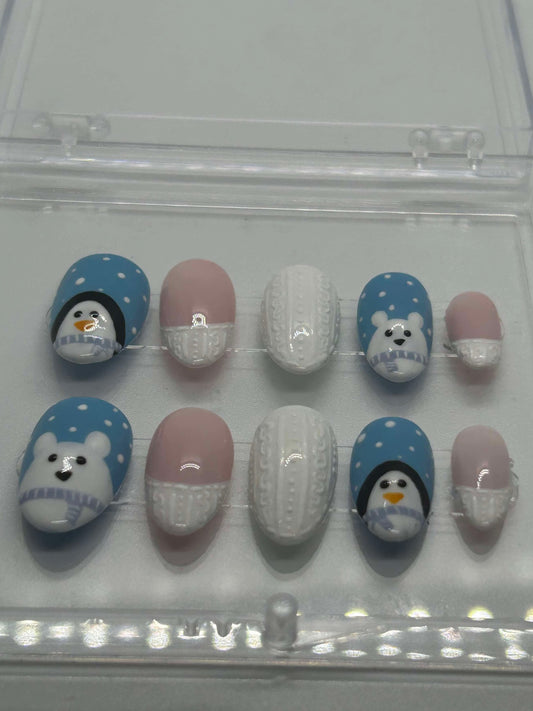 Polar bear and penguin knit gel nails